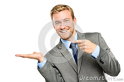 Happy young businessman showing empty copyspace on white background Stock Photo