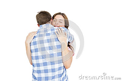 Happy young couple cuddling each other Stock Photo