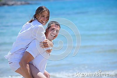 Happy young couple have fun on beach Stock Photo