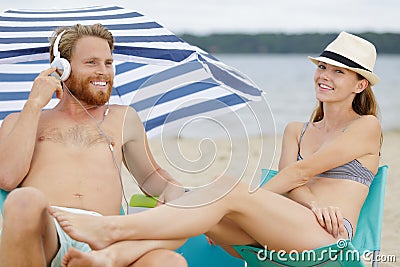 Happy young couple have fun and relax on beach Stock Photo