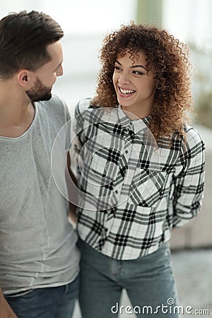 Happy young couple is hugging each other. Stock Photo