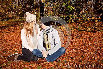 Happy young couple smilin in autumn outdoor Stock Photo