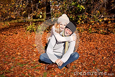 Happy young couple smilin in autumn outdoor Stock Photo