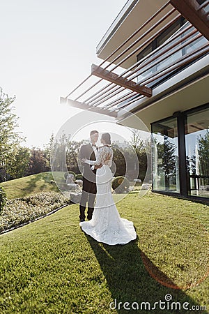 Happy young couple spends their honeymoon in a beautiful hotel traveling around Europe Stock Photo