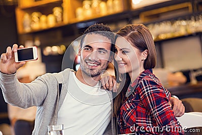 Happy young couple taking selfportrait Stock Photo