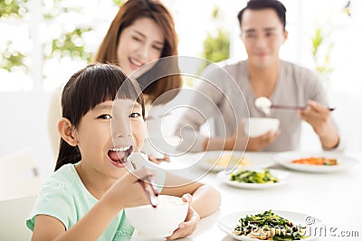 Happy young Family enjoy their dinner Stock Photo