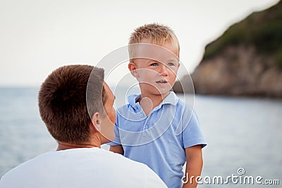 Happy young father with little son outdoors Stock Photo