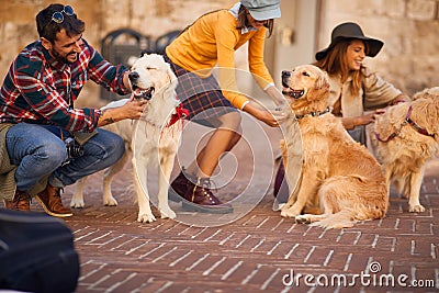 Happy friends with dog have fun and travel together on vacation Stock Photo