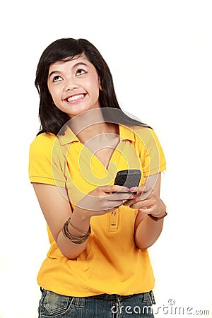 Happy young girl text message Stock Photo