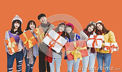 Happy young group showing the gifts and celebrating Christmas festiva and new year holiday Stock Photo