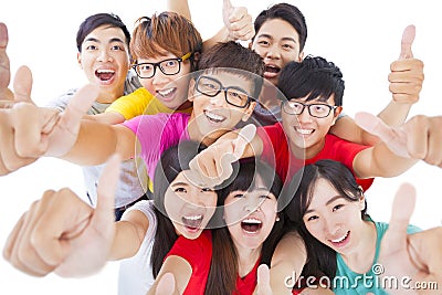 Happy Young group with thumbs up Stock Photo