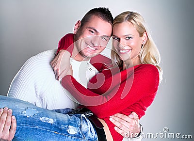 Happy Young loving couple hugging Stock Photo