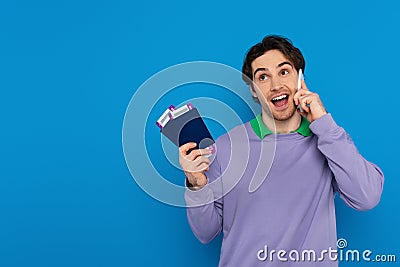happy young man holding passports with Stock Photo