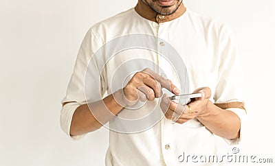 Happy young man using smartphone with application Stock Photo