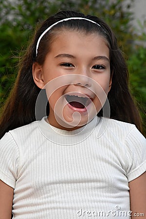 A Happy Young Philippina Adolescent Closeup Stock Photo