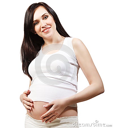 Happy young pregnant woman in white Stock Photo