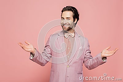 happy and young showman in suit Stock Photo
