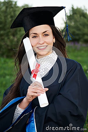 Happy Young smiley graduate girl Stock Photo