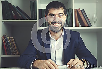 Happy businessman in office Stock Photo