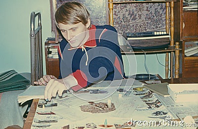 Happy and young soviet student playing popular game Stock Photo