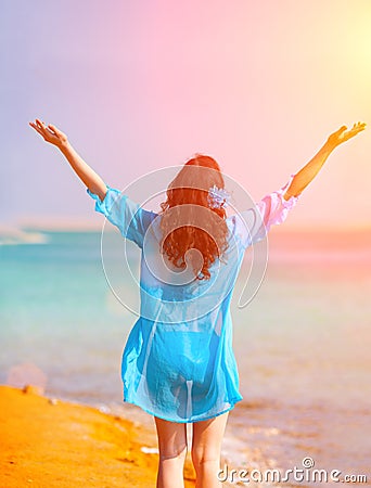 Happy young woman enjoing the sun Stock Photo