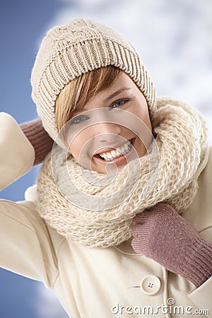 Happy young woman enjoying sunny winter day Stock Photo