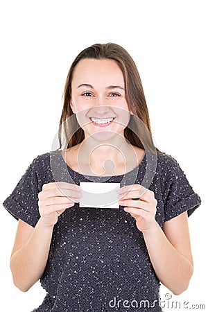 Happy young woman holding empty blank paper credit card and showing Stock Photo