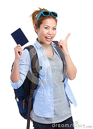 Happy young woman holding passport Stock Photo