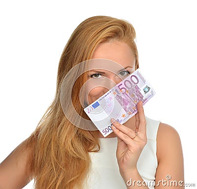 Happy young woman holding up cash money five hundred euro Stock Photo