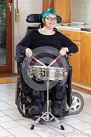 Happy young woman with infantile cerebral palsy. Stock Photo