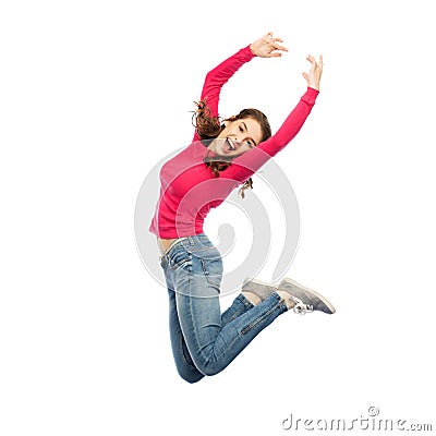 Happy young woman jumping in air or dancing Stock Photo