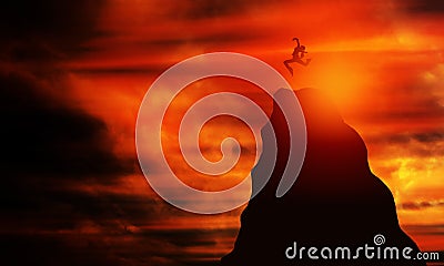 Happy young Woman jumps on joy on Peak of Maintain at Sunset. Stock Photo