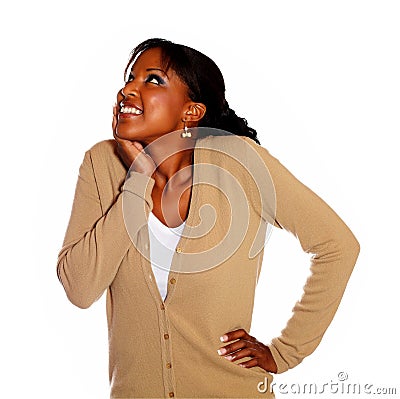 Happy young woman looking up Stock Photo