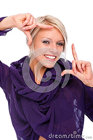 Happy young woman making a frame gesture Stock Photo