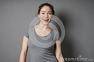 Happy young woman with radiant smile Stock Photo