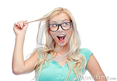 Happy young woman or teenage girl in glasses Stock Photo