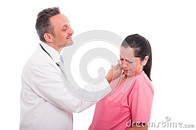 Harassment at work with medic and female nurse Stock Photo