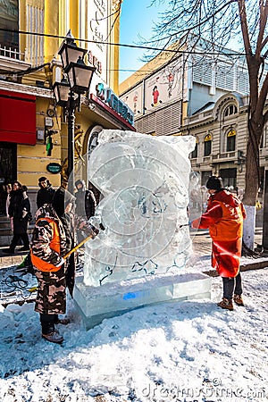 HARBIN, CHINA - DEC 30, 2018 : Ice sculptures, The workers are carve ice into various shape, located in Zhongyang Street Central Editorial Stock Photo