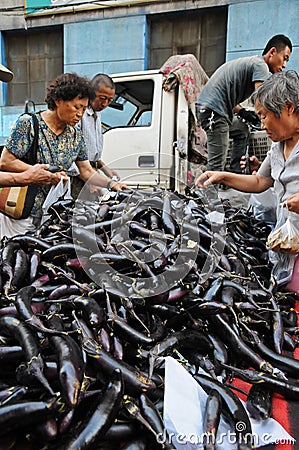 Hawkers and peddlers selling food and grocery in walking street Editorial Stock Photo