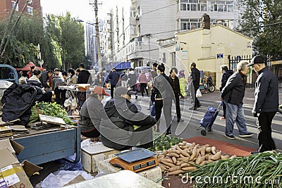 Harbin farmers market vegetables on the street Editorial Stock Photo