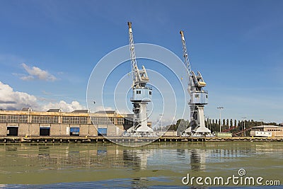 Harbor cranes in Gdansk. Poland Stock Photo