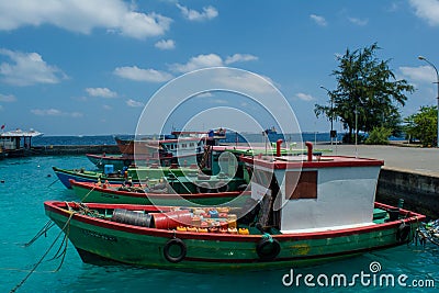 Harbor with fishermen`s boats at the Villingili tropical island Editorial Stock Photo