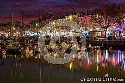 La Rochelle - Harbor by night with beautiful sunset Editorial Stock Photo