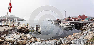 Harbour and pontoon on misty day in town of Qaqortoq, Greenland Editorial Stock Photo