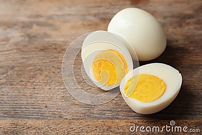 Hard boiled eggs on wooden table. Stock Photo