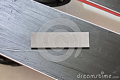 Hard chrome mill file used for ski edge repairs, tuning, sharpening. Top down view, close up. Stock Photo