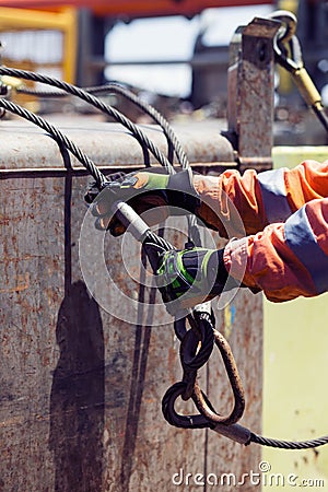 Able seaman working on deck during cargo operations Stock Photo