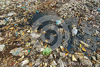 Hard plastic garbage decomposition. Pollution from the consumer society. Stock Photo
