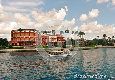 The Hard Rock Cafe at Universal Orlando Resort in Florida with the lake on the foreground. Editorial Stock Photo