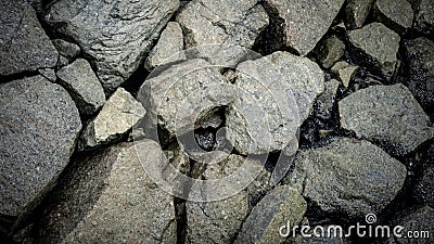 Hard and rough rocks at the beach Stock Photo